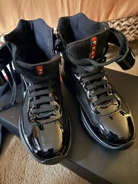Authentic Prada Black Patent Leather High-Top Sneakers with Red Logo Tab